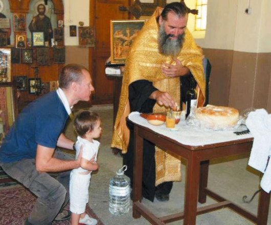 Максимилиян бе кръстен от отец Васил