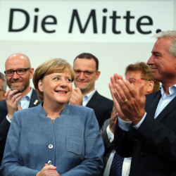 Ангела Меркел след изборите, които спечели, но е с отслабени позиции. Сн.: БТА